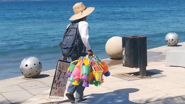 Baja la demanda en los vendedores de playa