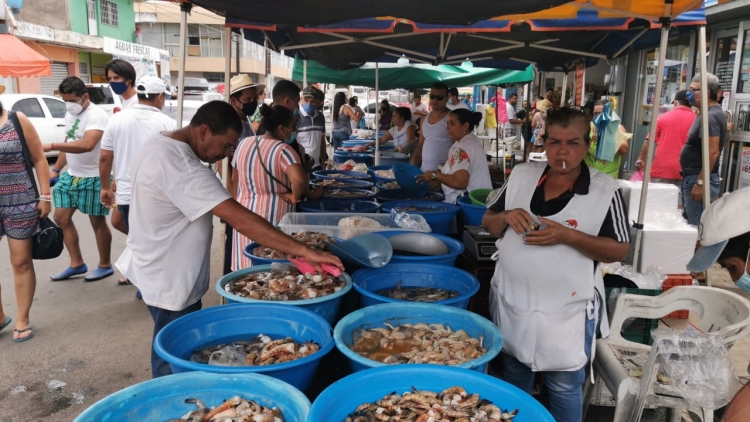 Changueras reportan buenas ventas de mariscos