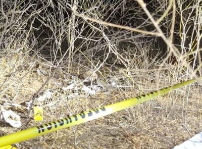 Con el rostro encintado con plástico hallan a un ejecutado en el Campo Cuba en la sindicatura de Costa Rica
