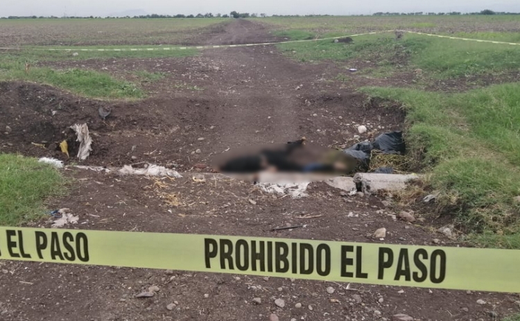 ¡Quemado! Descubren cuerpo sin vida de un joven en un dren del Ejido Canán, en Culiacán